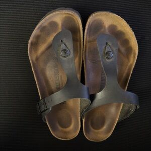 Birkenstock Black Strap Sandals with Brown Footbed